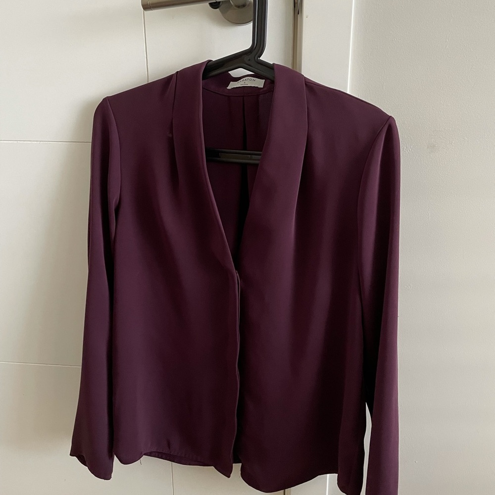 Babaton power blouse.
